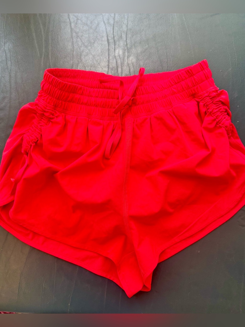 Lululemon Red Glow XXXS 1.5” High-Waist 
side-cinch short. Worn 1x